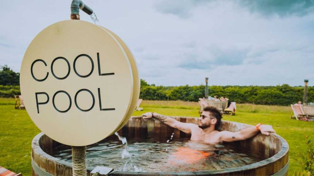 Man in cool pool during contrasting bathing therapy at Paus in Cambridge